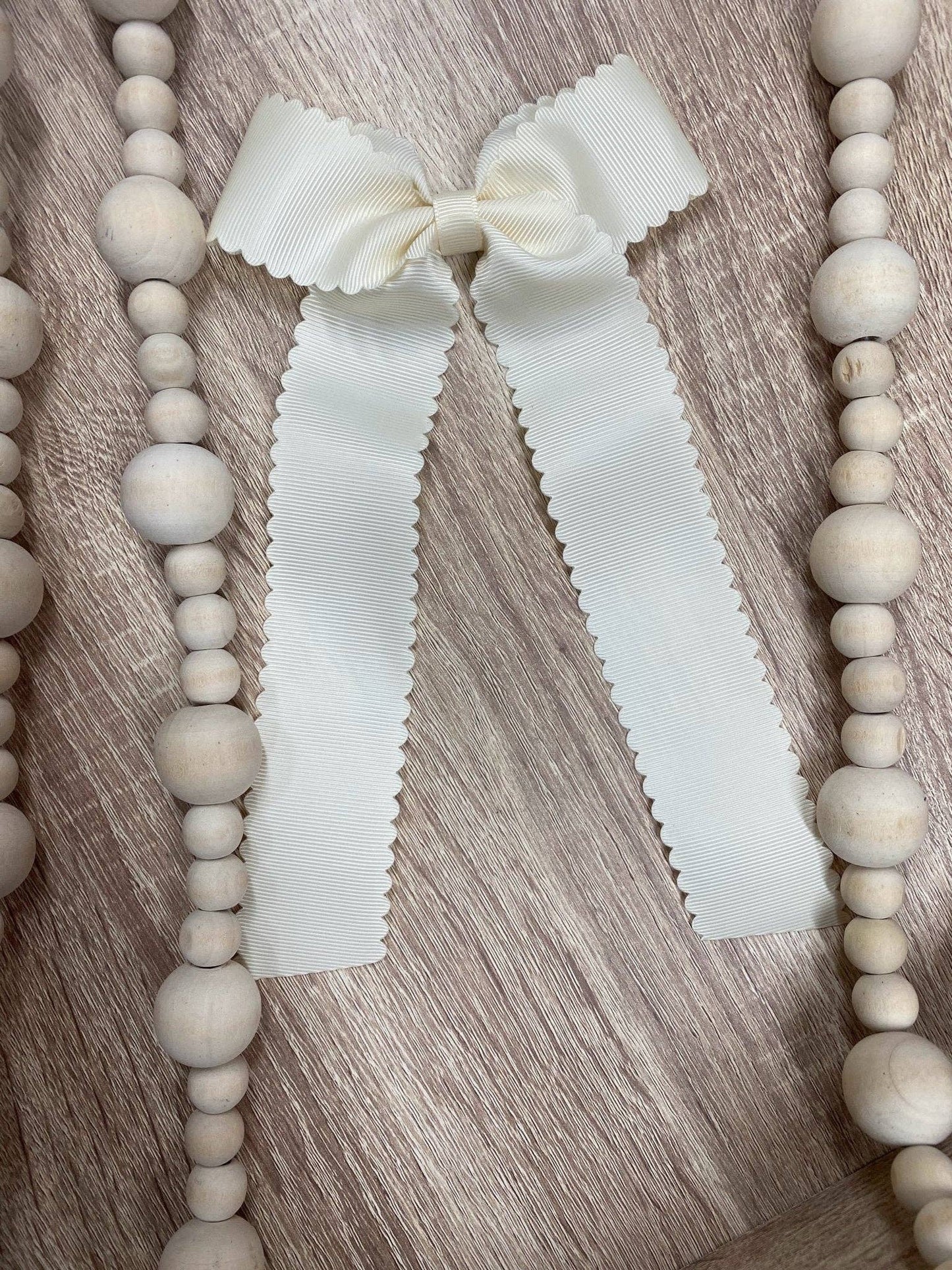 Scalloped Long Tail Bow