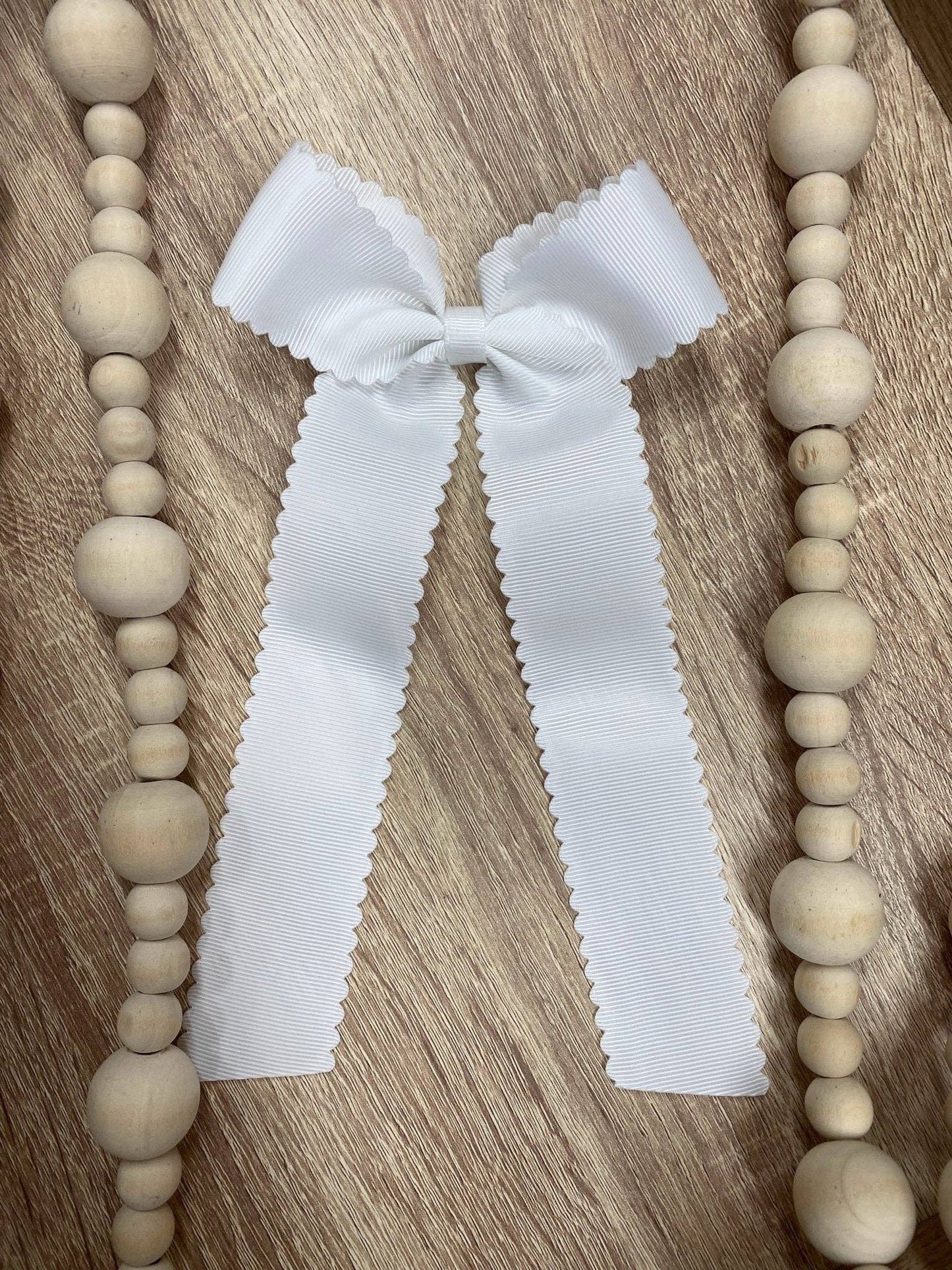 Scalloped Long Tail Bow