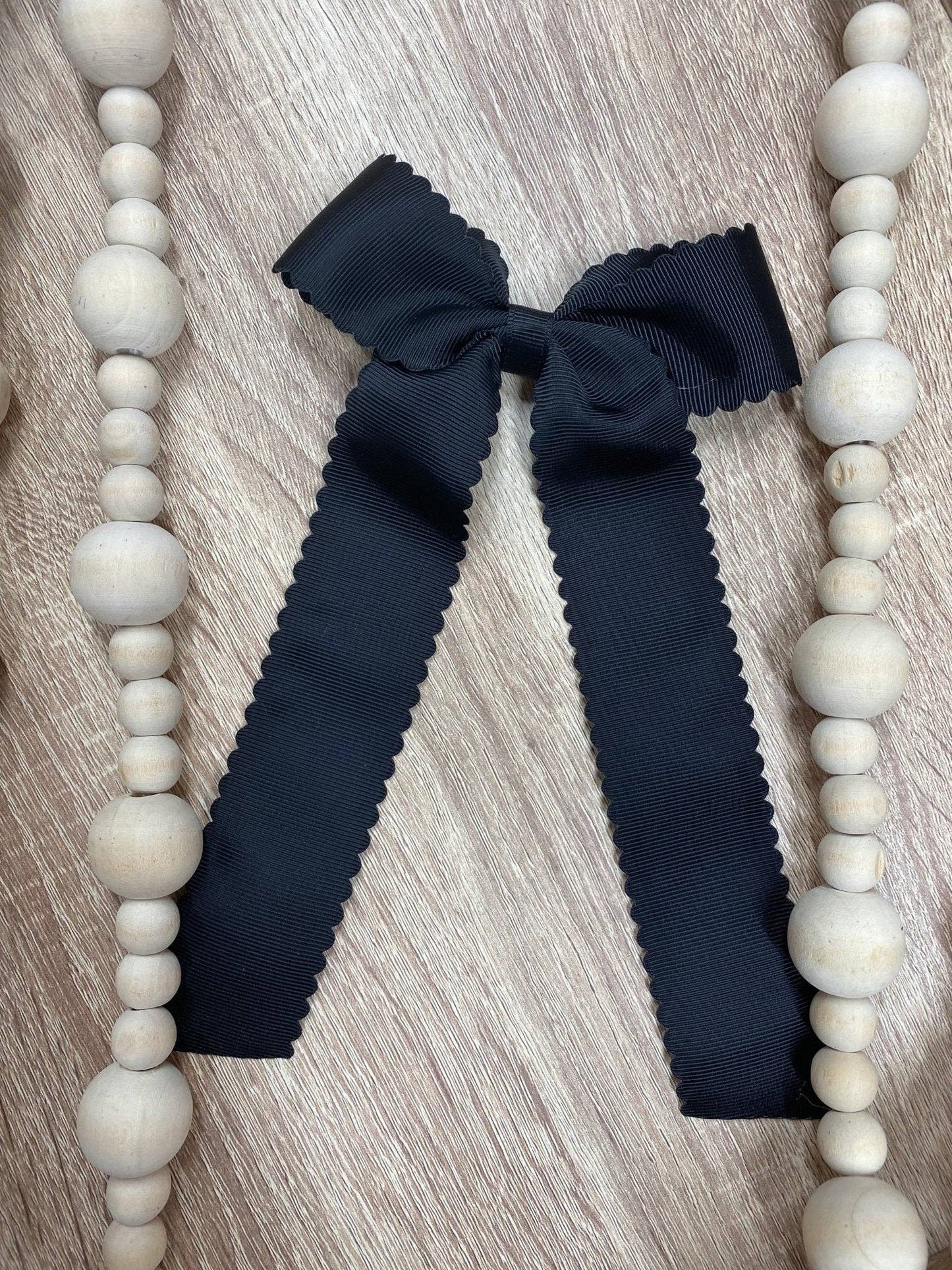 Scalloped Long Tail Bow