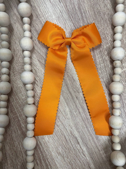 Scalloped Long Tail Bow