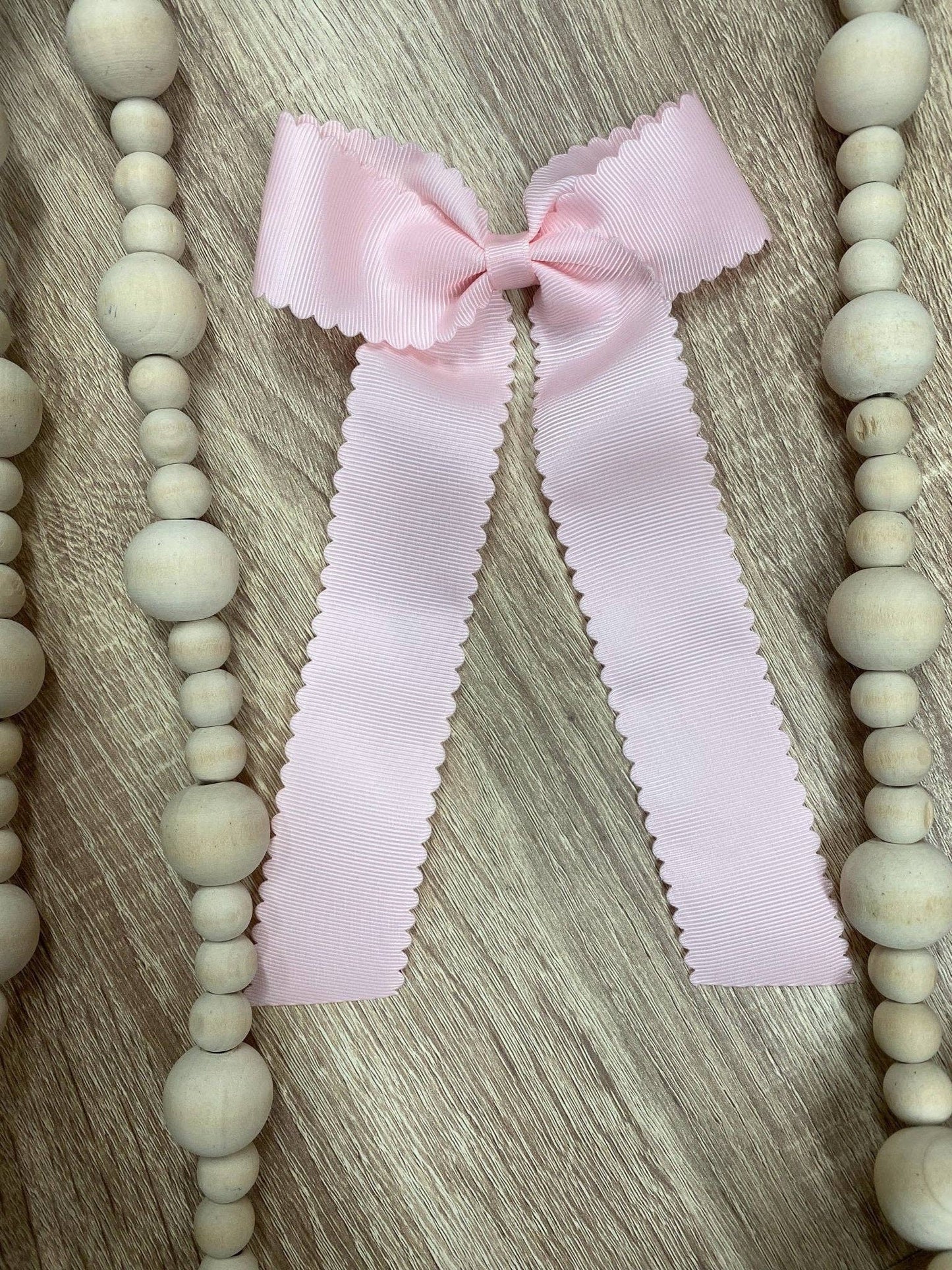 Scalloped Long Tail Bow