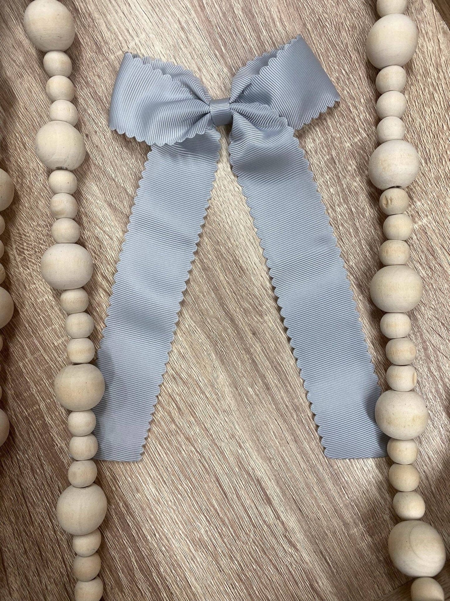 Scalloped Long Tail Bow