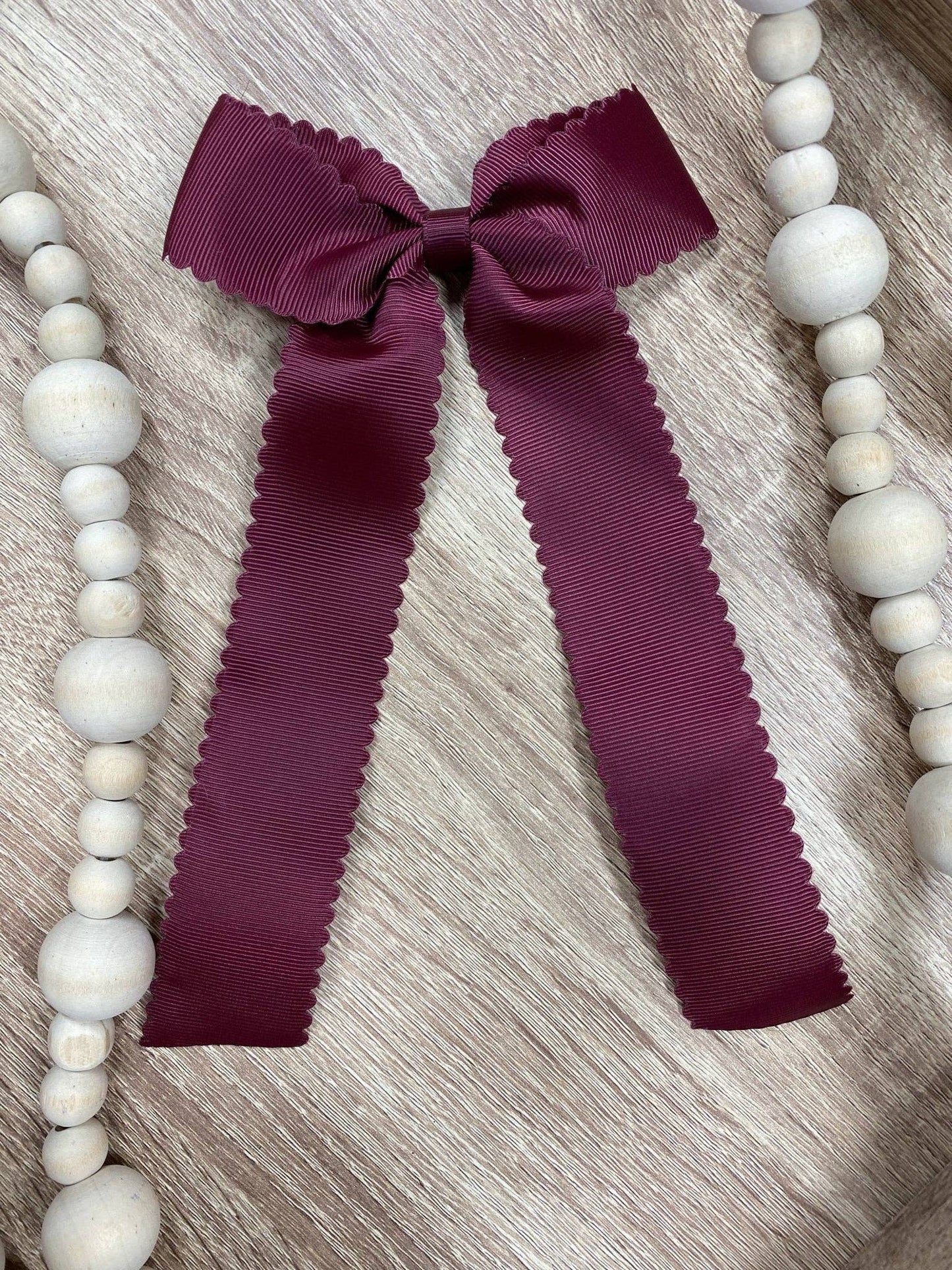 Scalloped Long Tail Bow