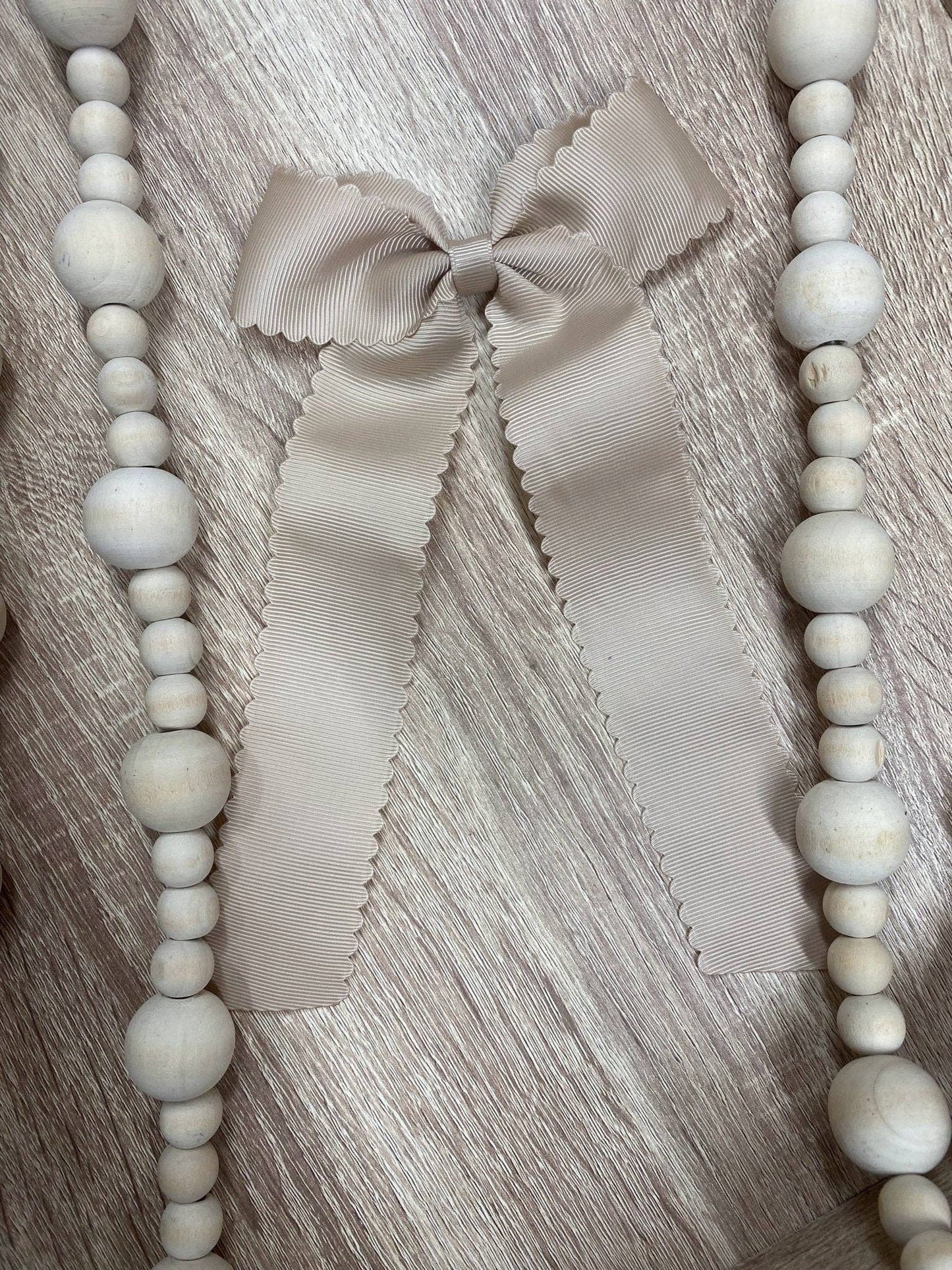 Scalloped Long Tail Bow