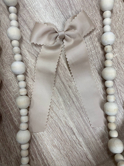 Scalloped Long Tail Bow