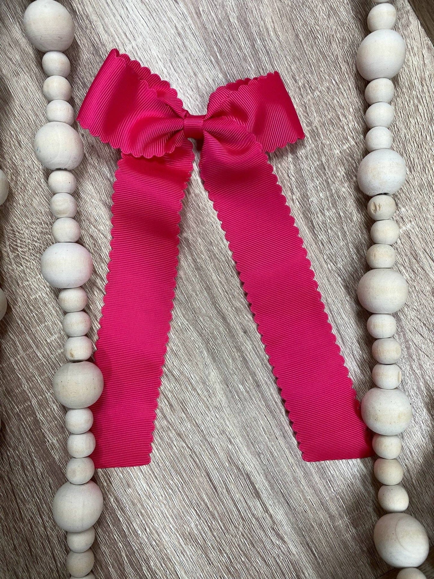 Scalloped Long Tail Bow