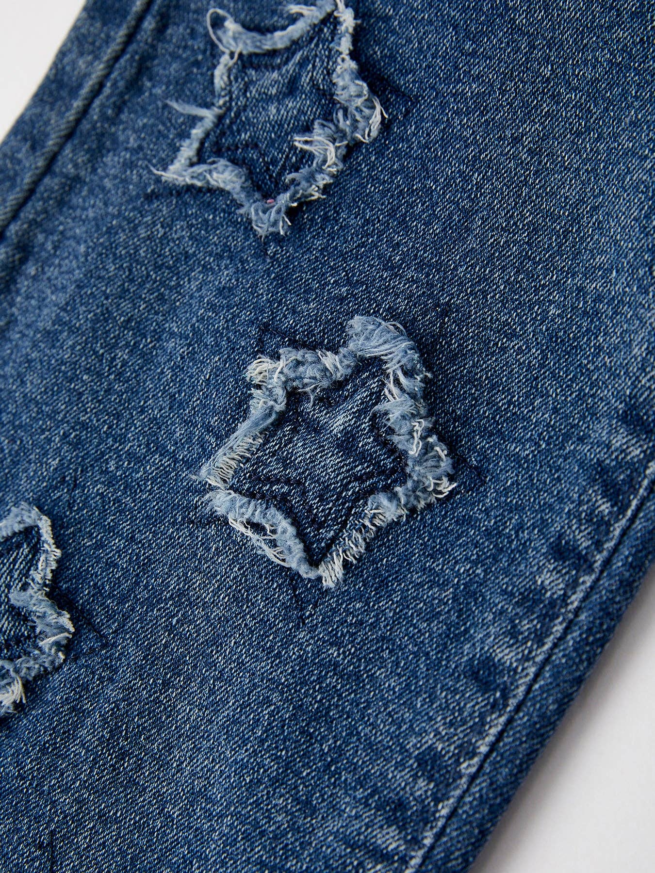 Star Shaped Distressed Jeans